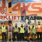 4KS Forklift Training team celebrating zero shortfalls in their Annual RTITB Audit